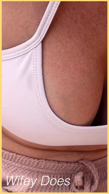 Wifey shows perfect cleavage in this tight white sports bra check out this hot MILF amazing cleavage