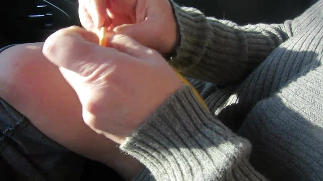 putting a rubber on a banana