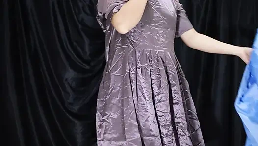 A young girl is trying on a new pair of lingerie