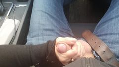 My milf wife jerking cock while driving car