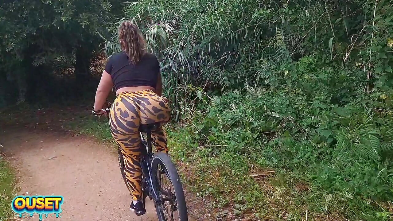 Big ass in tight leggings rides through the woods on a bike and ends up sucking and fucking outdoors with her huge ass