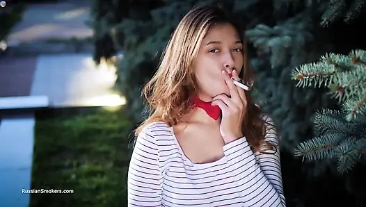 Sultry Russian Girl Smoking Cigarette by Waves