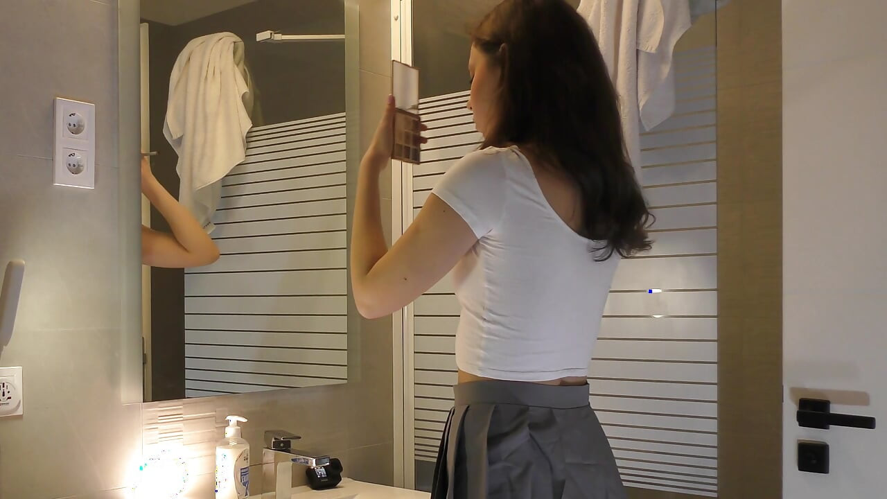 Long legs hot college girl Alicia in her plaid school uniform mini skirt and stockings in the bathroom