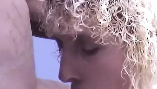 Amature blonde babe sucks dude's black dick in the living room