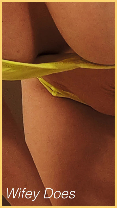 Wifey wears a skimpy yellow bikini