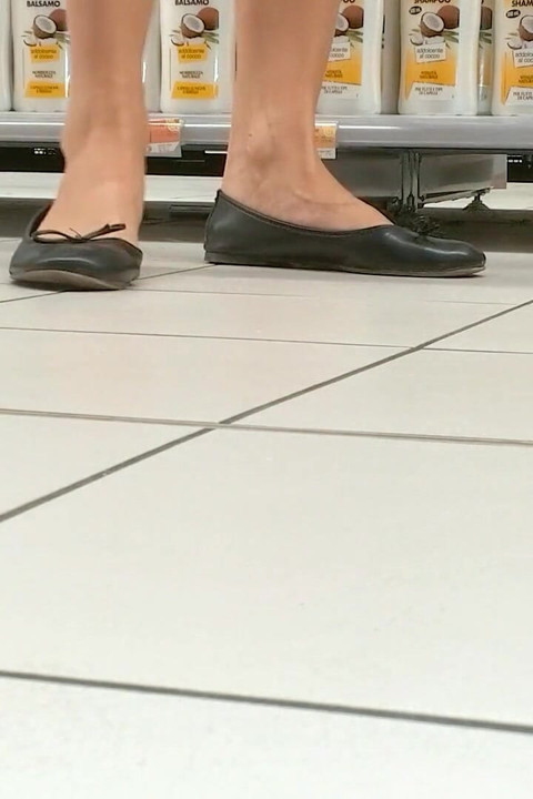 Footplay and Dipping in Black Flats at a Conad Store