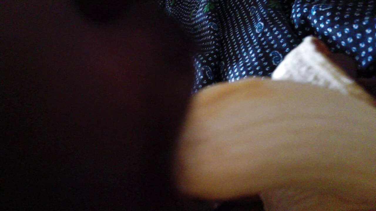 Indian Young boy eating banana at private room