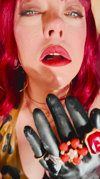 The Beautiful Rubber Beauty Tina Snua Smoking A Cigarette Using A Holder - Smoker Latex Gloves Rings Jewellery | Clip 1