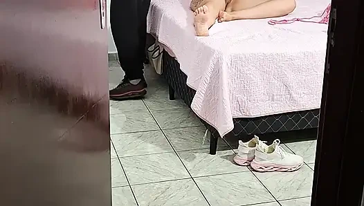 Stepfather helps stepdaughter take off her clothes to go to bed.