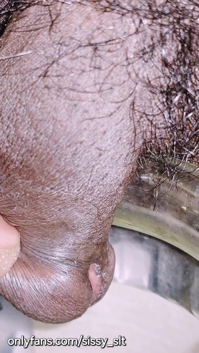 Must-see moment from "Limp little penis crossdresser pissing outdoor"