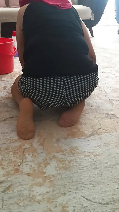 My big-buttocked, turbaned stepmother while cleaning