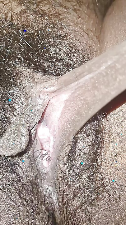 The village woman is showing her large pussy
