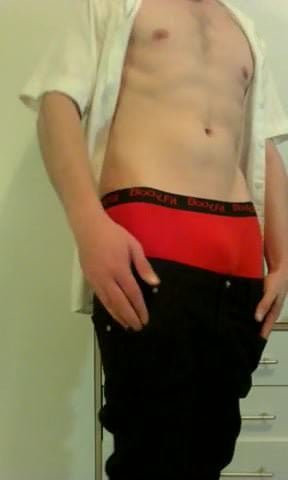 sagging black slim jeans in red boxerbriefs