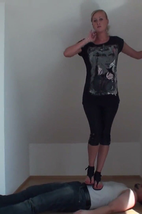 Flat-heels stepping over him