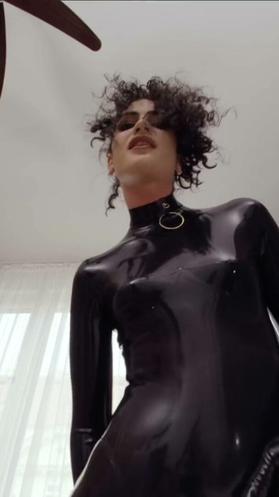 Goth Queen Lydia Black Stuns in Full Latex Bodysuit | Clip 1