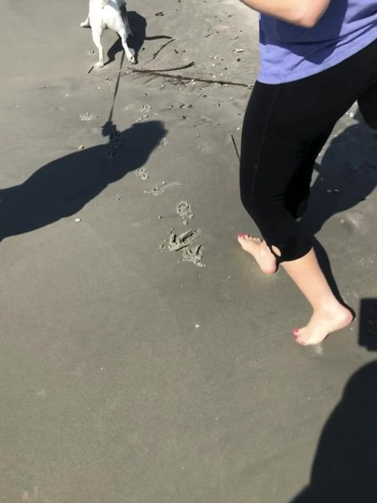 Sister in Law's feet in motion on the beach