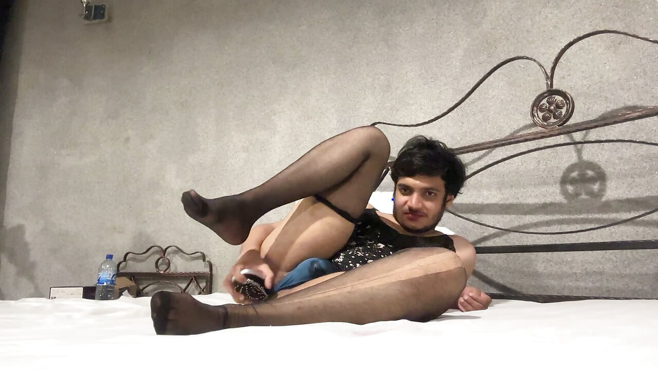Sexy sissy slut in feminine clothing deep throats her toy then begins fucking herself to orgasm