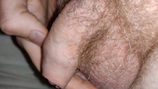 Fiddling with soft hairy cock