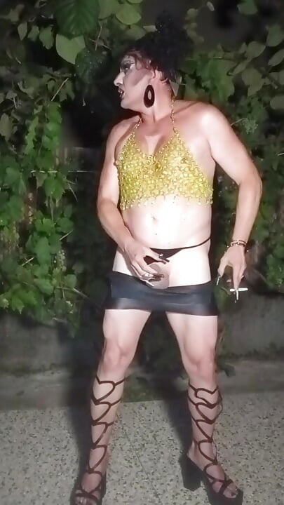 Sexy mature slut transvestite shows off, masturbates and cums outdoors