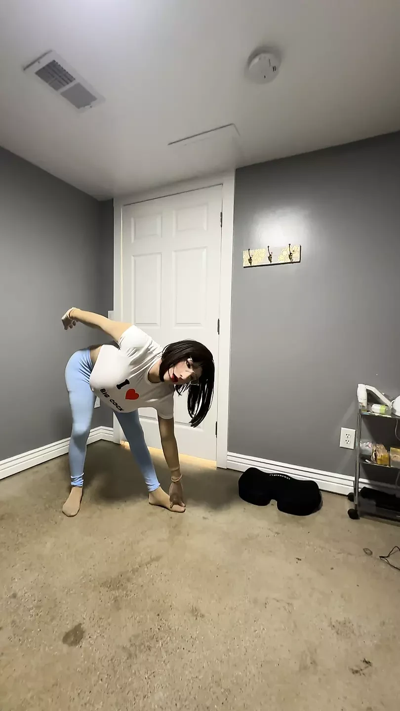 Hot trans CD in Tight blue leggings doing some yoga wit her favorite shirt