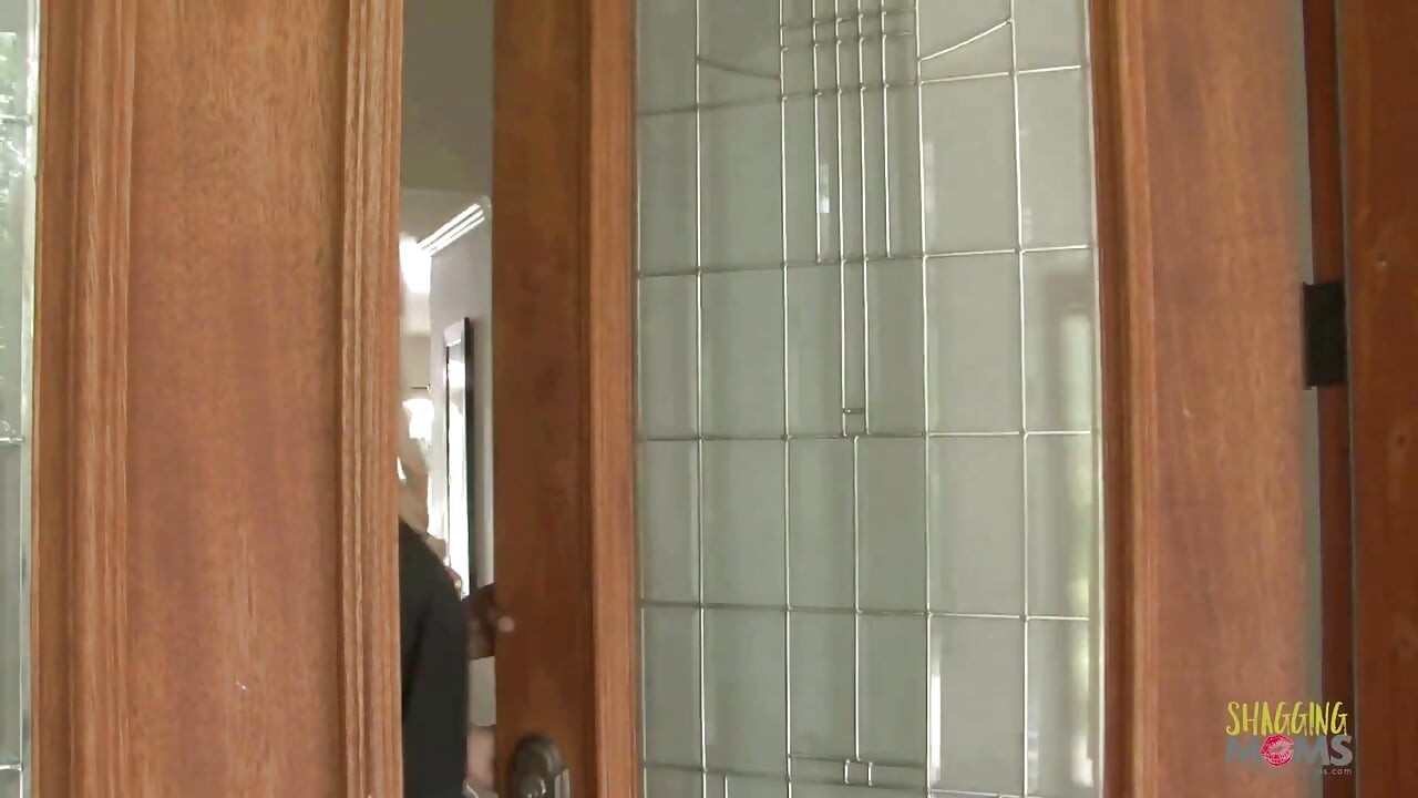 Curvy blonde babe gives a black guy a blowjob before having sex with him