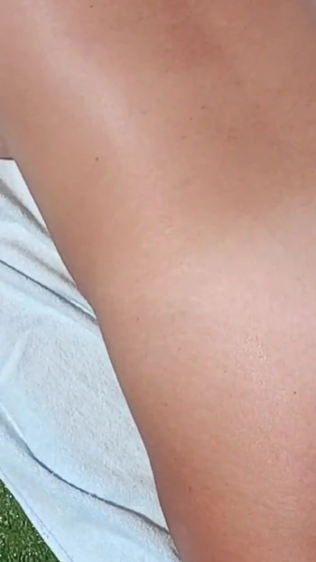 Epic moment from "Sexy french milf sunbathes naked and rubs sunscreen in her tanned vody"