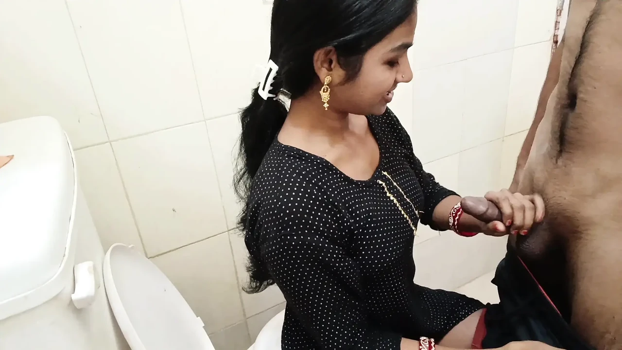 While Bhabhi was sitting on the toilet doing potty, I was watching porn and fingering her pussy. Then I went in and fucked her p