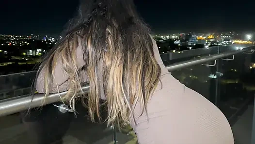 A horny Mexican woman fucks her hot stepbrother on the balcony of their house, flashing her huge breasts in the open air!