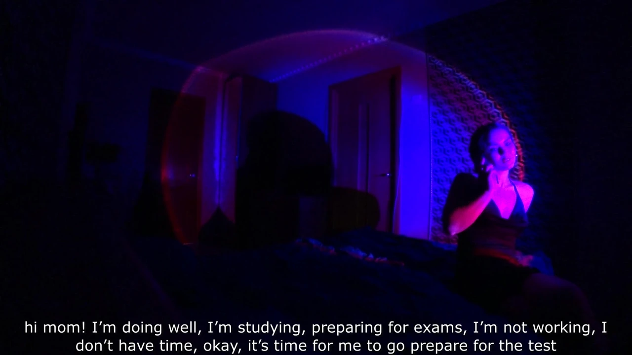 Student Masseuse Talking to Her Mom on Phone While Waiting for Her Client