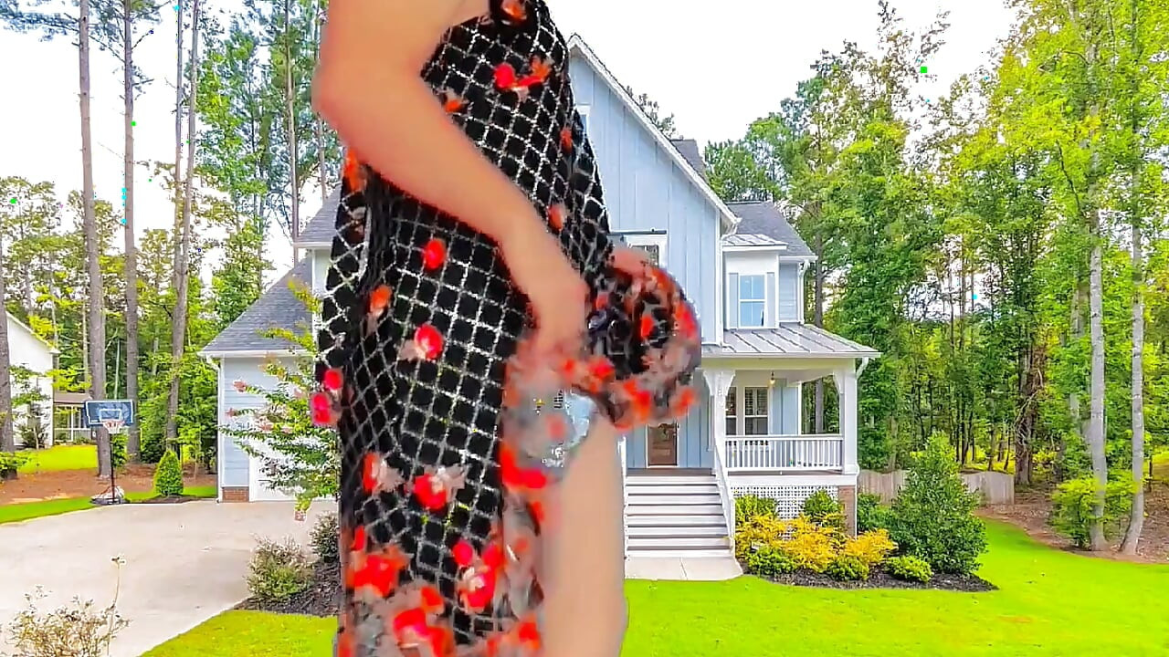 Cute sissy holding stuffed bunny in bed playfully