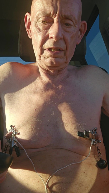 Captivating moment from "nipple torture with spiked clamps and tens unit"