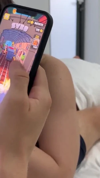 Key moment from "Sucking my bf's cock while he plays subway surfers game"