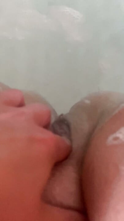 Massaging my pussy in the bath
