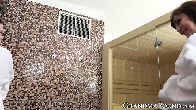 Slutty granny seduces innocent young man into shower sex