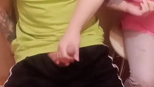 A woman jerks off my cock close up