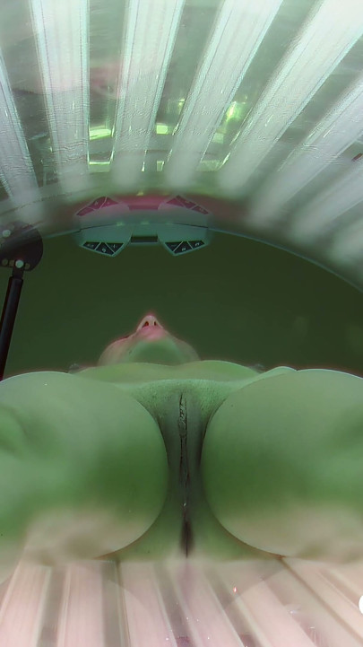 Czech Solarium 92: Brunette Enjoys Her Solarium Session, Flashes Her Pussy