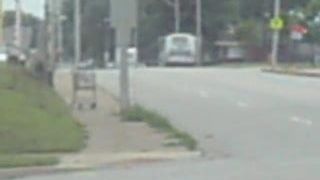 lincoln bus going through on Lincoln street and walnut