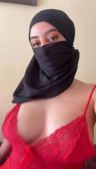 Hijabi solo tease with big juicy titties  Arab Muslim slut plays with her boobs