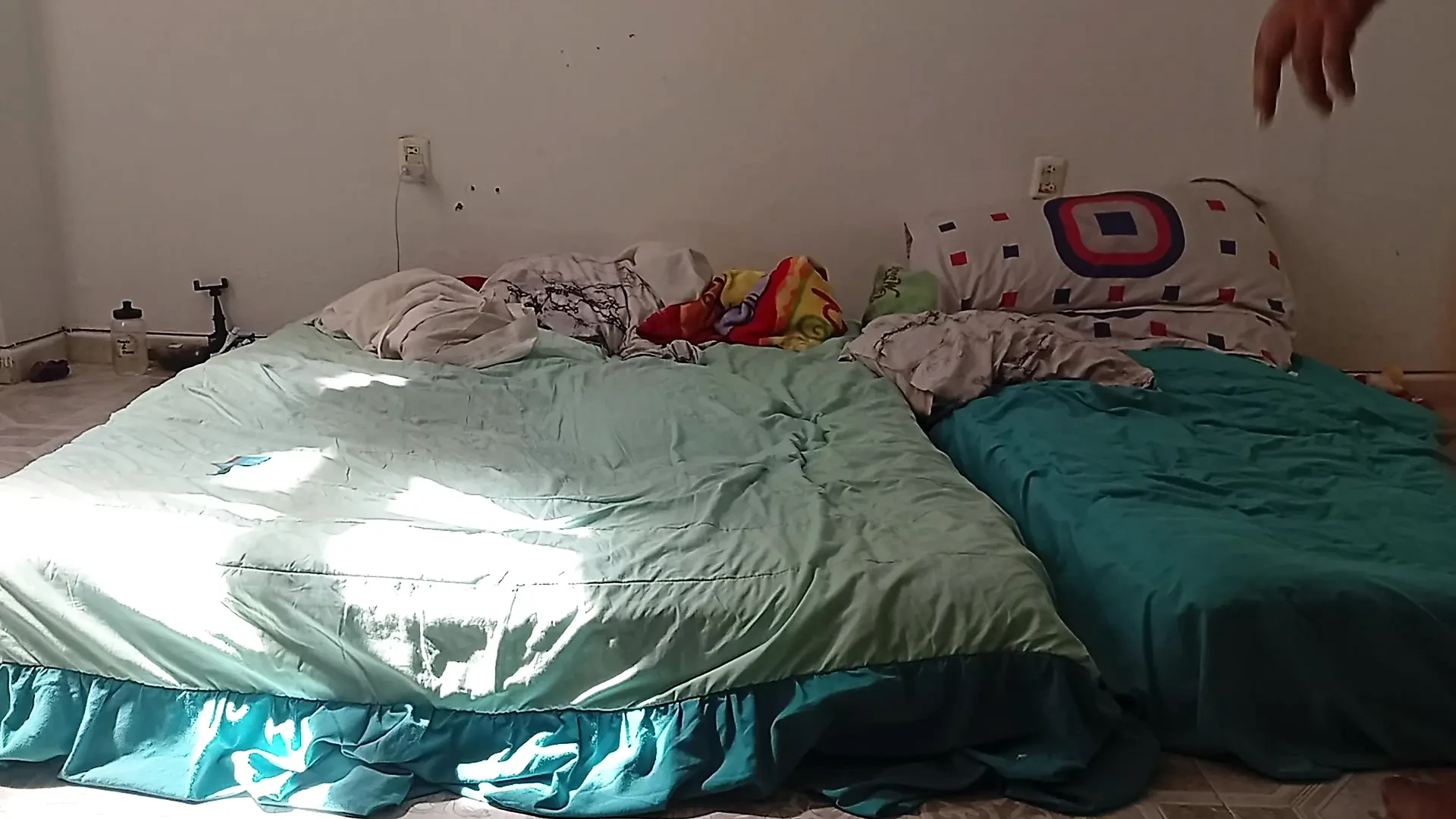 Mexican mother-in-law cleaning guest room in thong