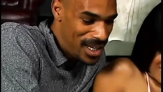 An Asian with a nice big ass is fucked in her ass by a black dude