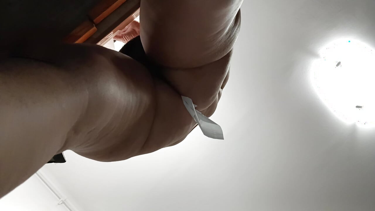 Amateur wife doing housework naked Sexy and naughty wife trying on clothes she cuts.