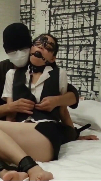 Key moment from "Kinky mature couple bondage SM play"