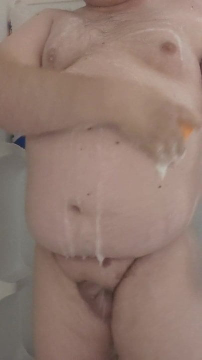 Chubby married man showers off