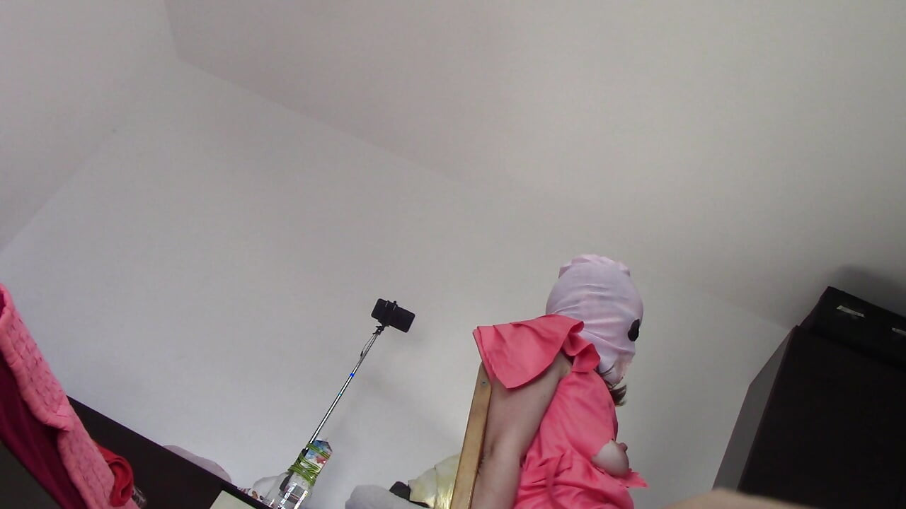 Amateur wife dancing naked at home. Amateur woman has fun trying on clothes and cutting them.