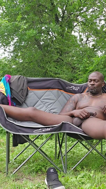 Captivating moment from "Sir Maxximus stroking his Big Black Dick in the Woods"
