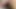 Girl pushes her ass on a black dildo