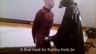 Rubtoy, in latex enjoying a session on the rack