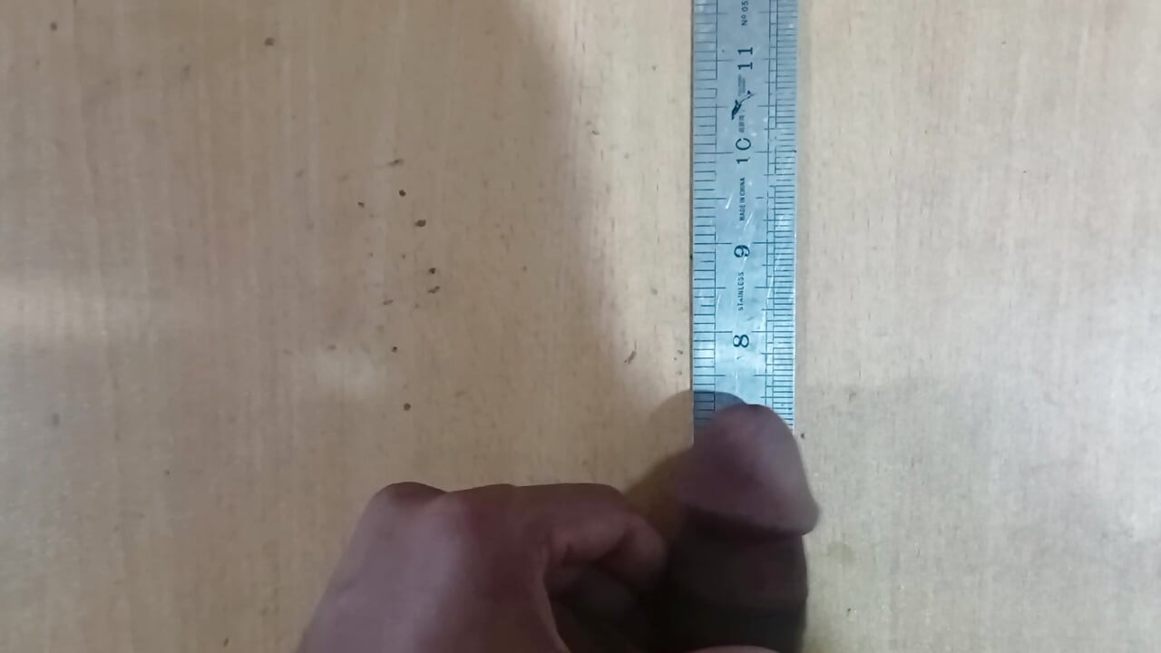 Desi boy Measure your own weight with a scale.