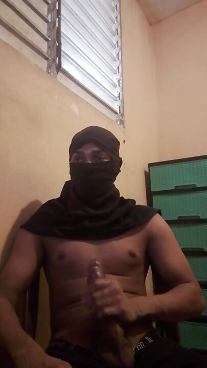 Masked big black cock masturbates
