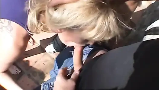 Blonde whore in hotpants gets three hard cocks filling up her holes